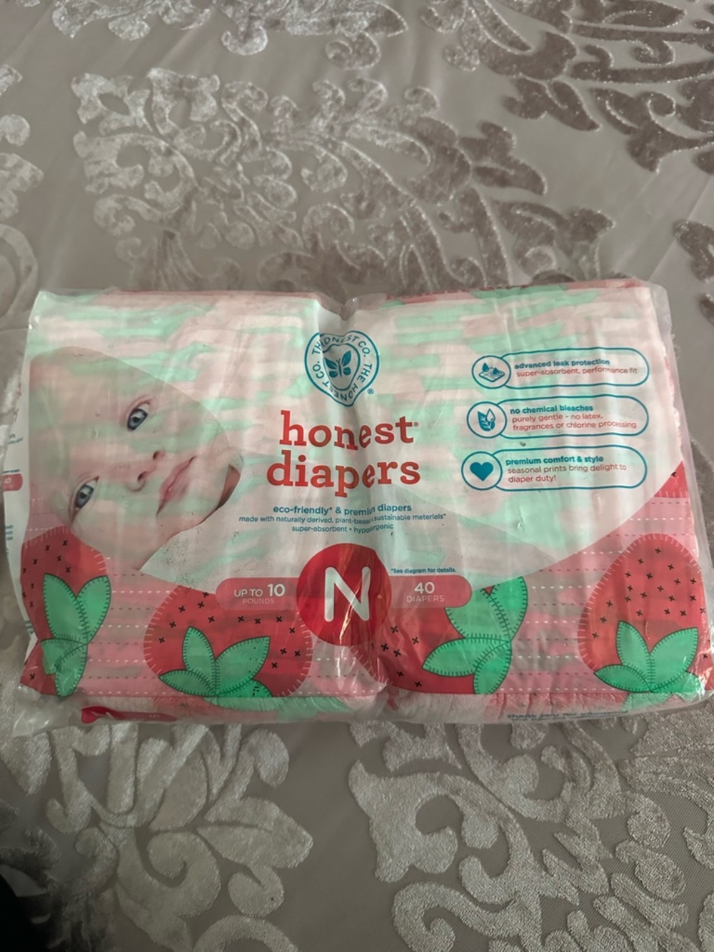 The Honest Company Pink Green Strawberry Print Diapers - Newborn